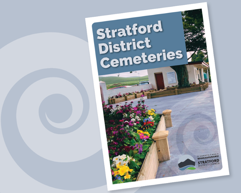 Stratford District Cemeteries booklet against a grey background with a koru design